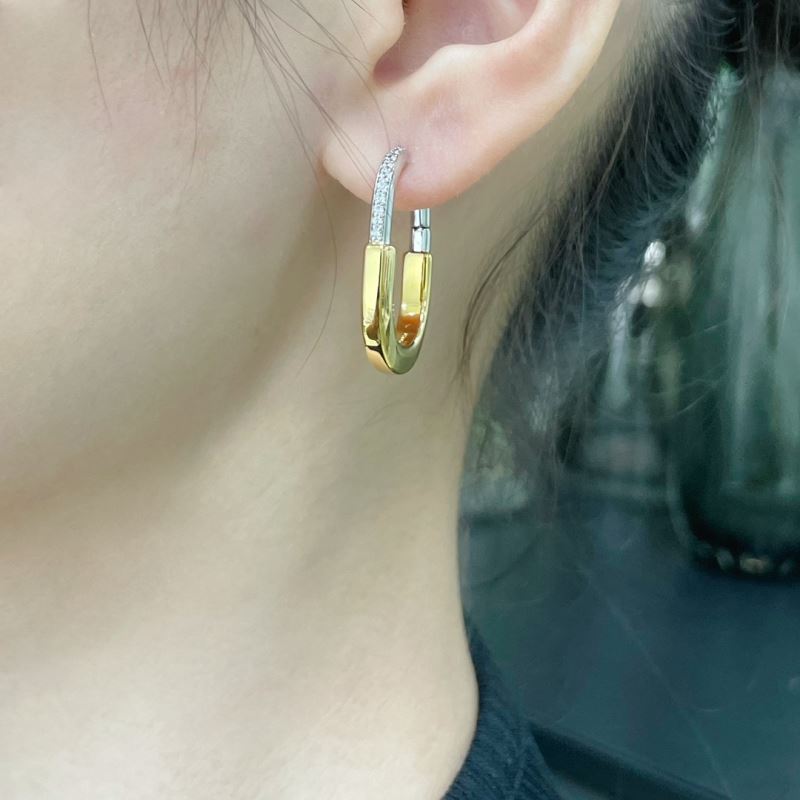 T*f*ny earrings